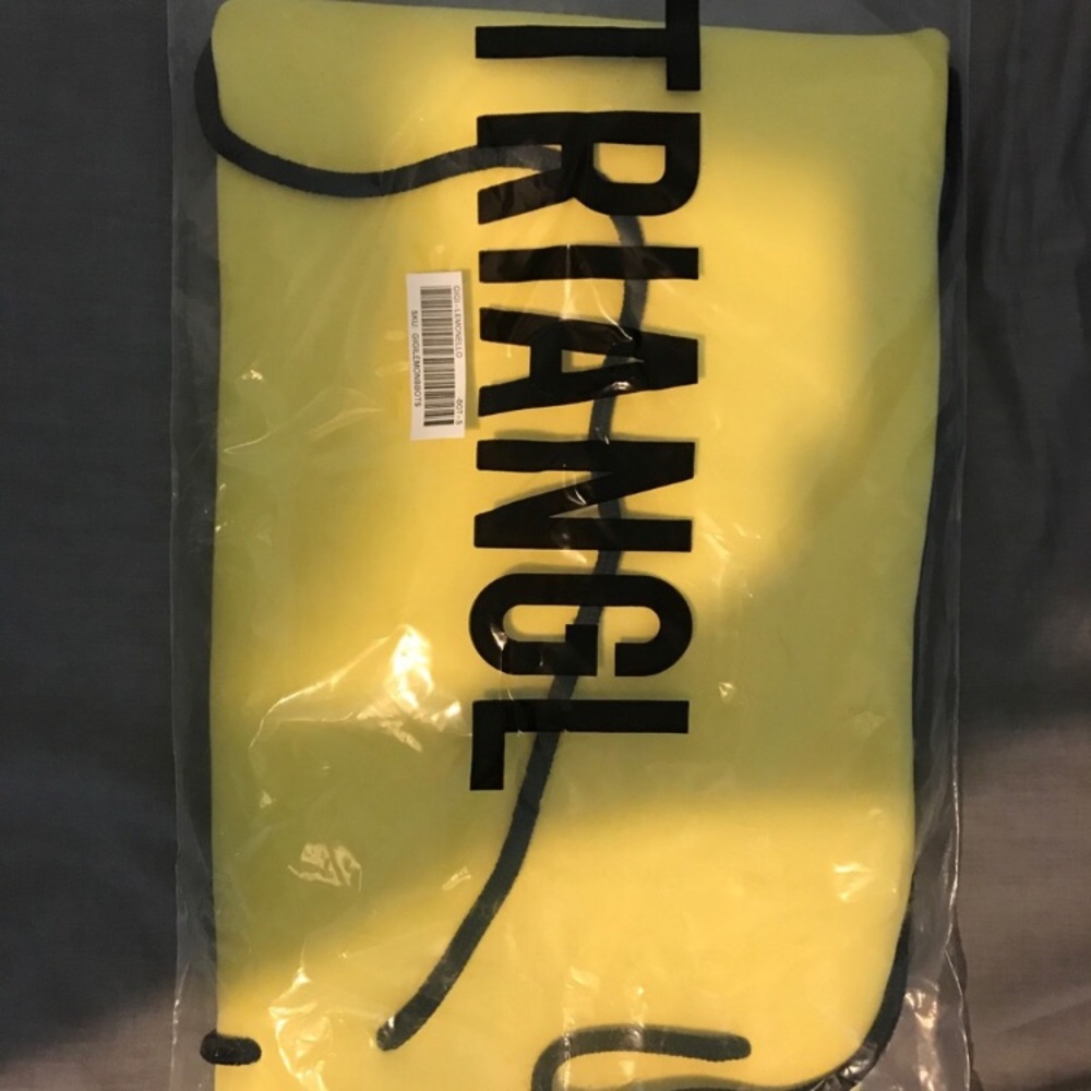 Brand new drawstring Triangl bag